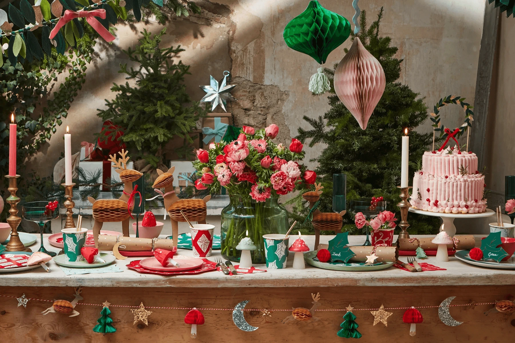 Festive event venue decorated with elegant lighting, themed décor, floral arrangements, and branded decorative elements