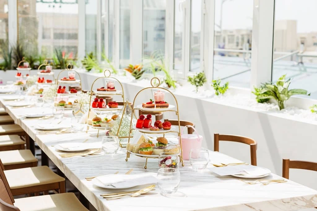 Elegant private event setup with stylish décor, ambient lighting, and beautifully arranged guest seating